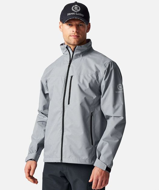 Man in gray jacket and cap, white background.