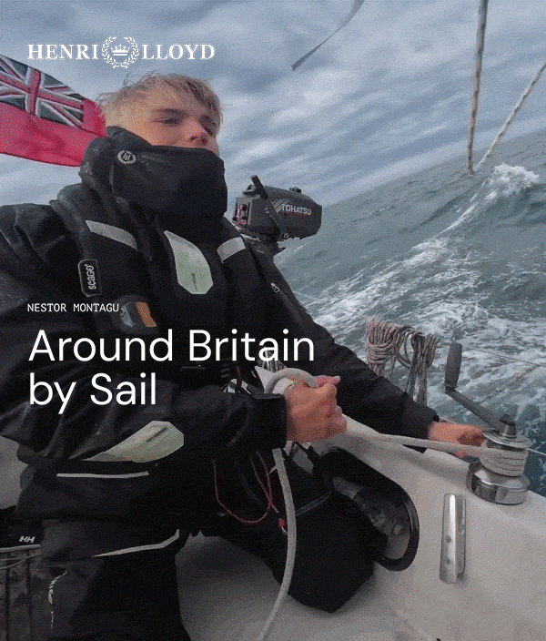 Person sailing with ropes and British flag.