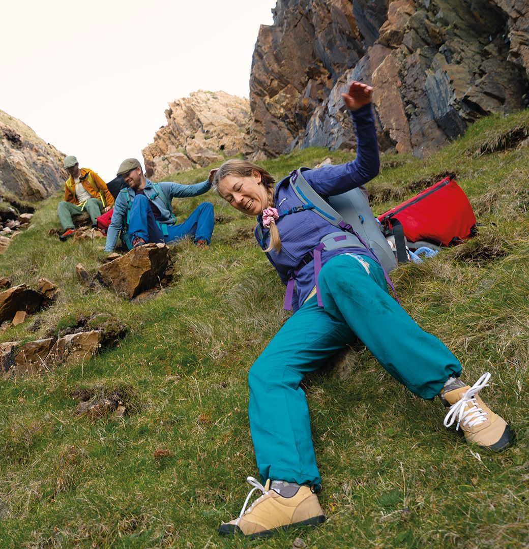 People hiking downhill