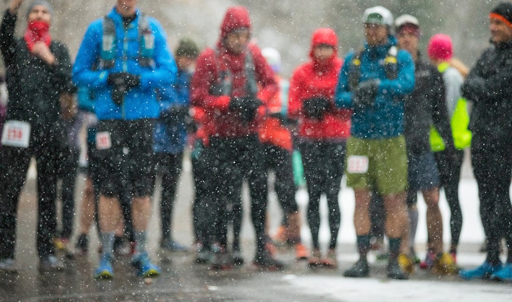 People running in the rain